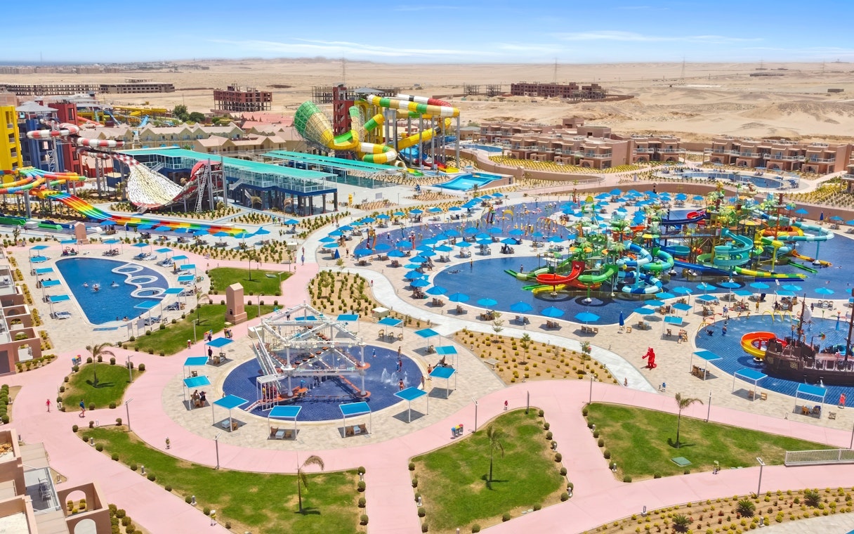 Aerial view of colorful water slides and pools at Neverland Waterpark, Pickalbatros, Hurghada.