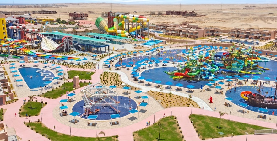 Aerial view of colorful water slides and pools at Neverland Waterpark, Pickalbatros, Hurghada.