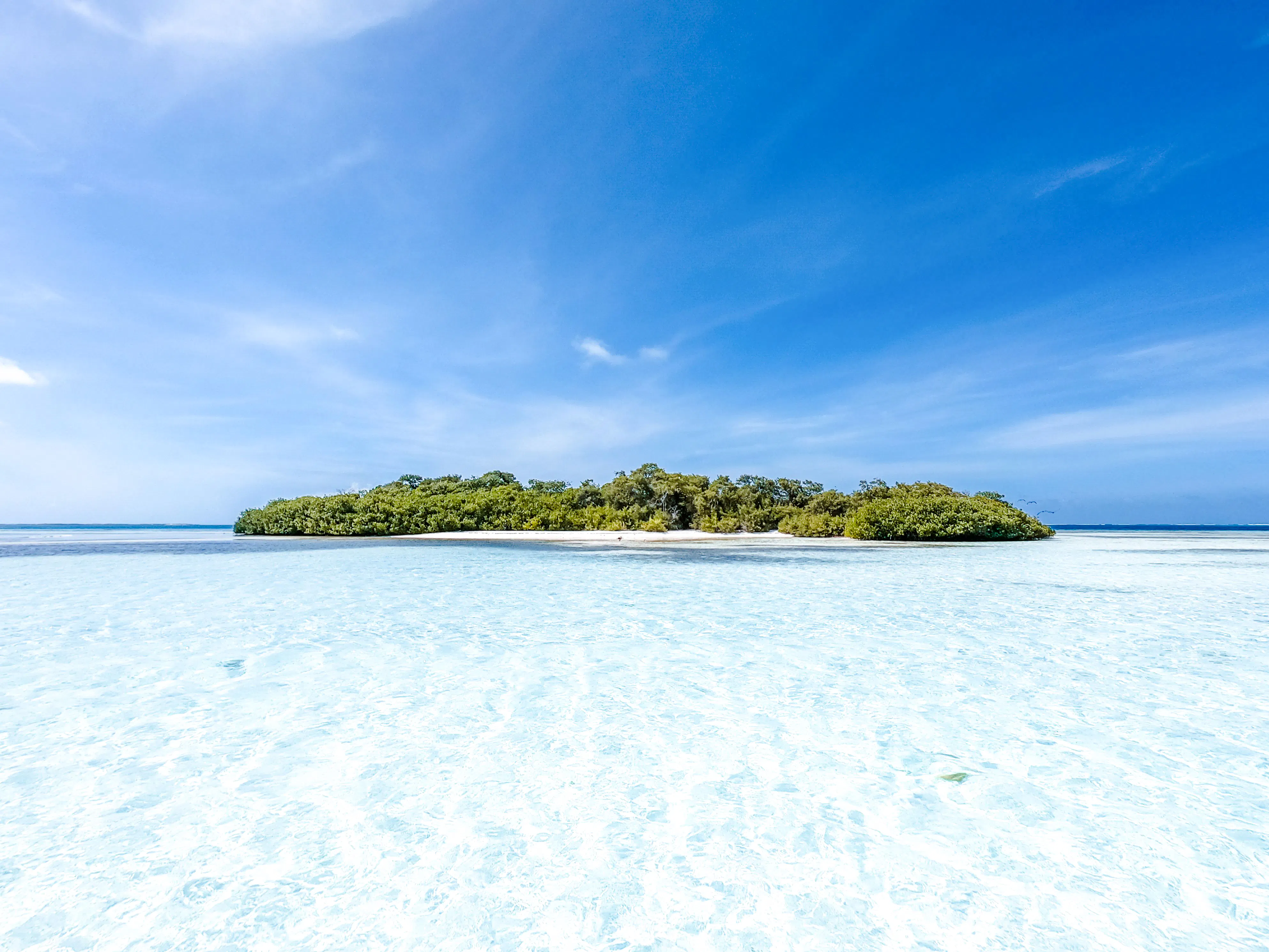 Mnemba Island Atoll with clear turquoise waters, Zanzibar.