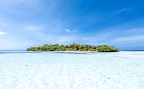 Mnemba Island Atoll with clear turquoise waters, Zanzibar.