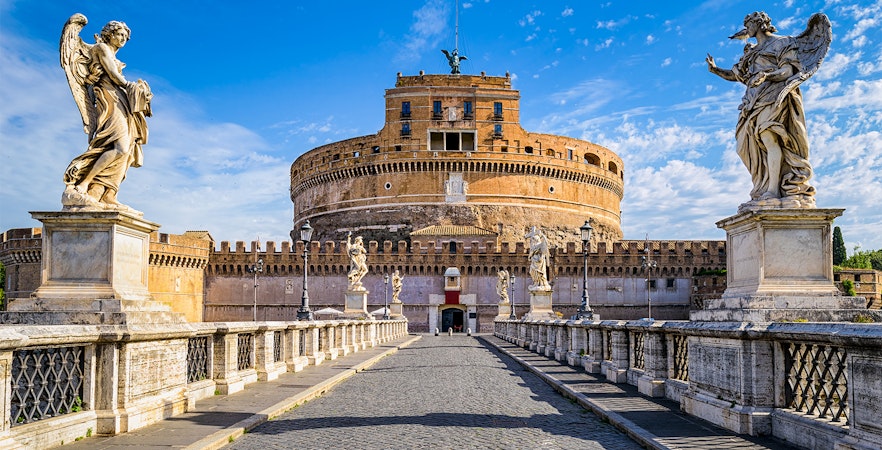 Castel Sant'Angelo and angel statues on Ponte Sant'Angelo in Rome.