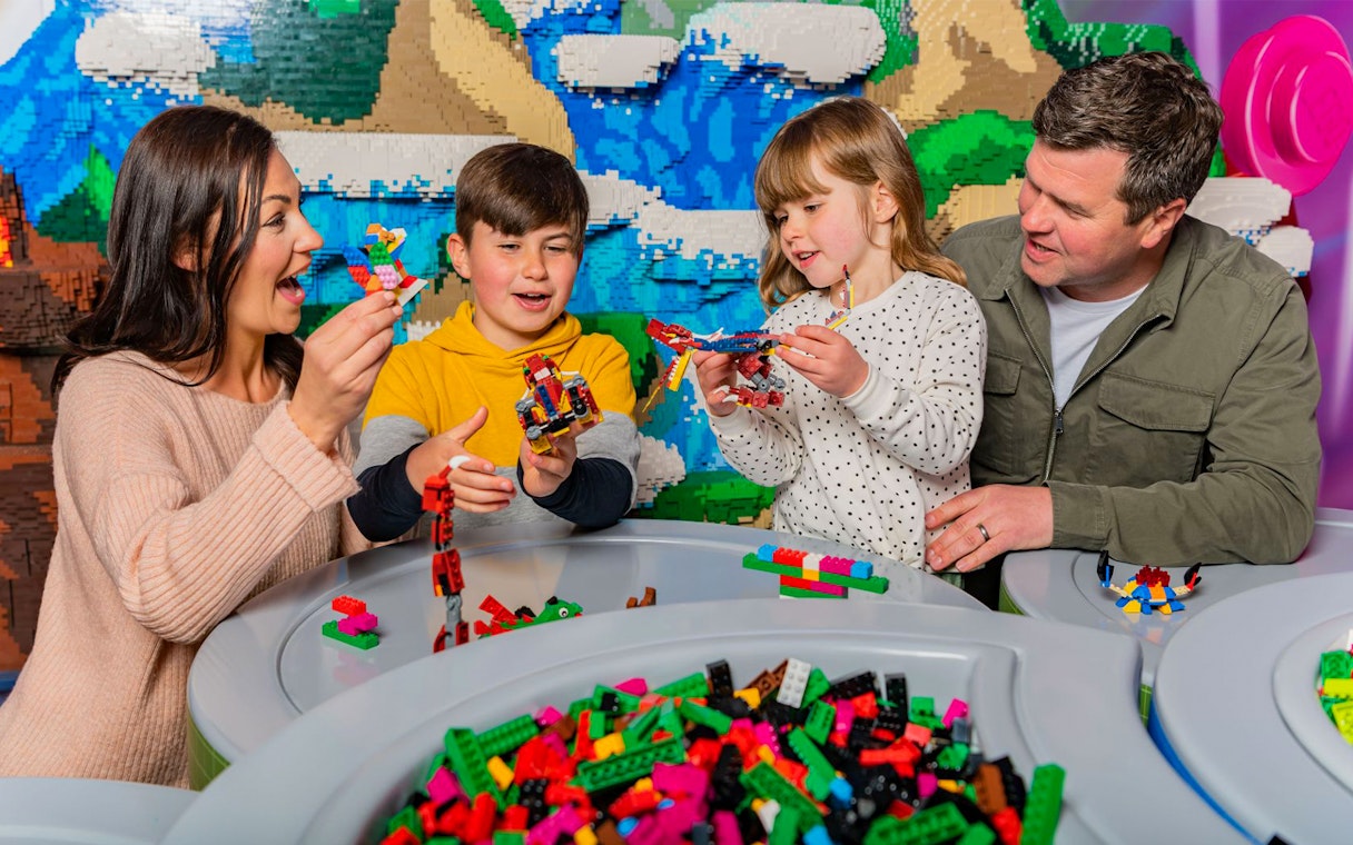 Family building LEGO creations at LEGOLAND® Windsor Resort.
