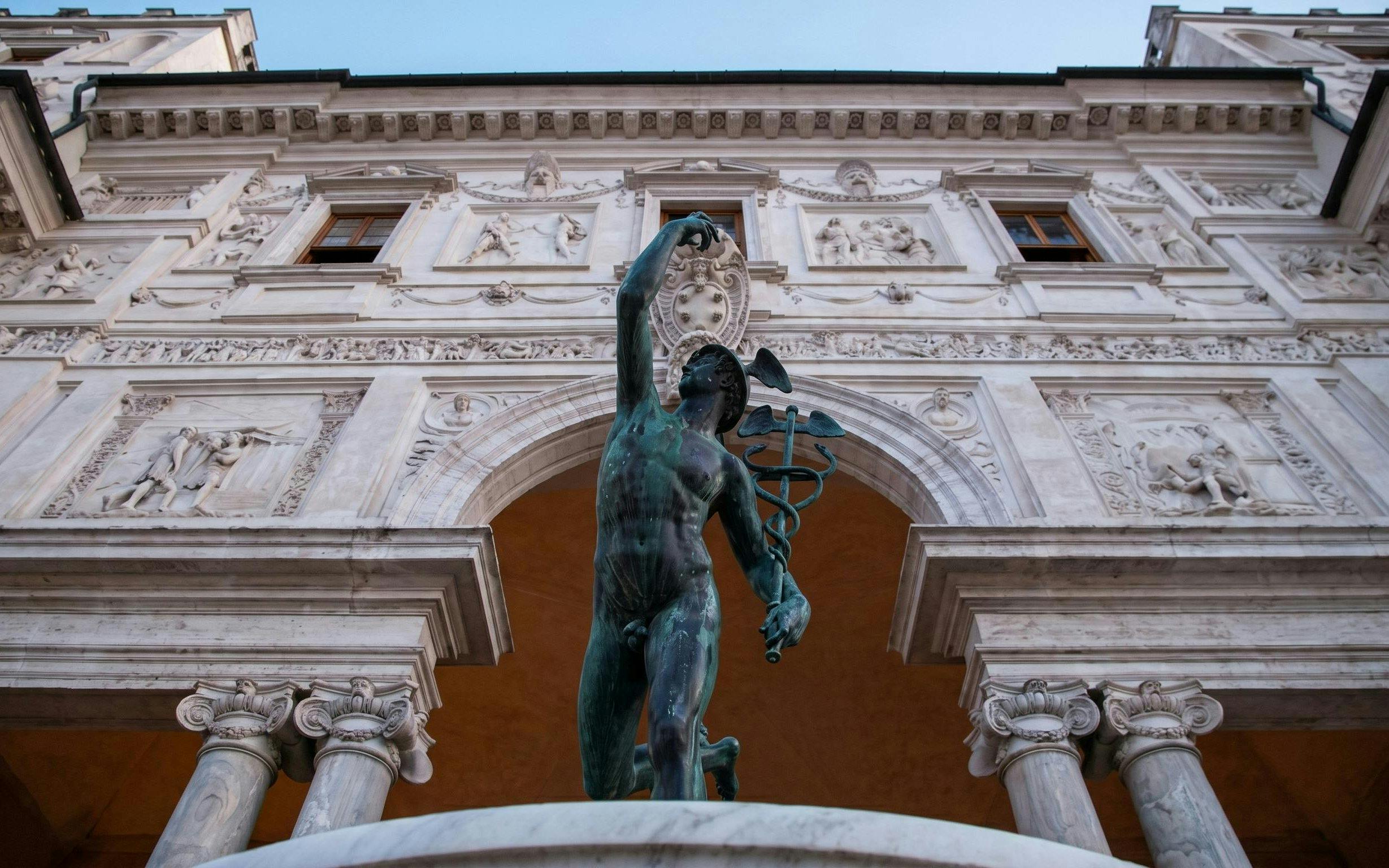 Statue of Mercury in front of Villa Medici facade, Rome.