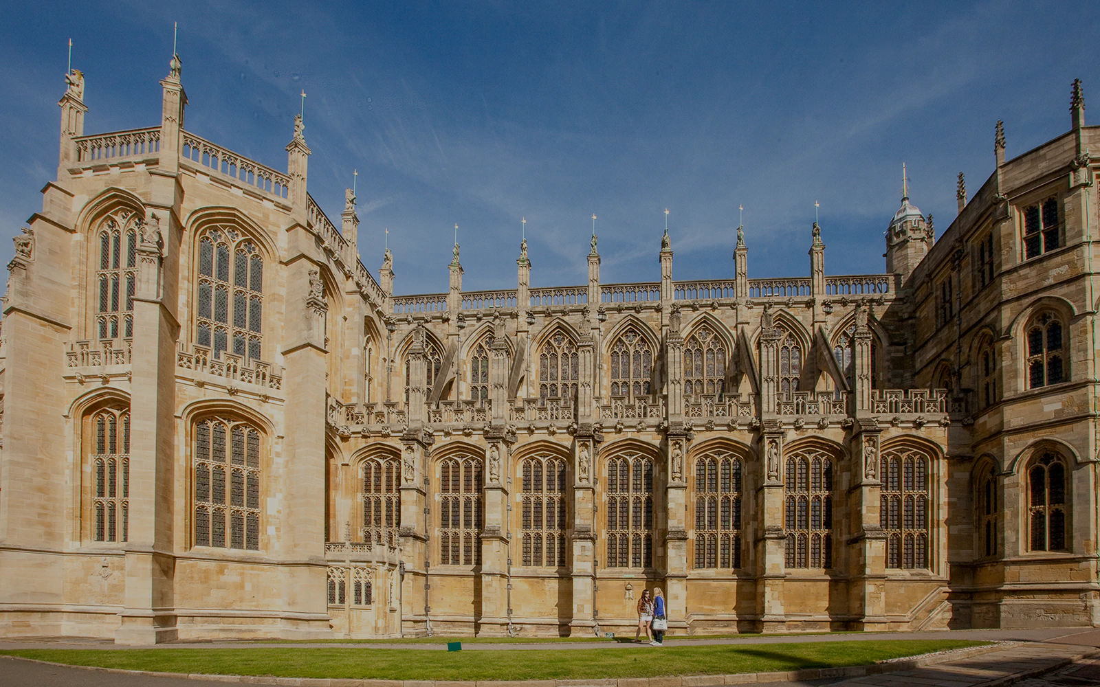 Exterior view of St George's Chapel at Windsor Castle, showcasing Gothic architecture.