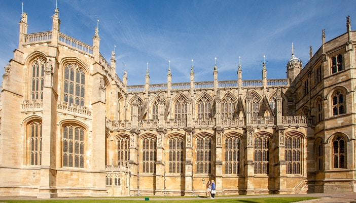 Exterior view of St George's Chapel at Windsor Castle, showcasing Gothic architecture.