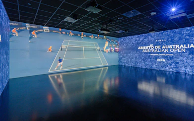 Rafa Nadal Museum interior featuring Australian Open tennis match display.