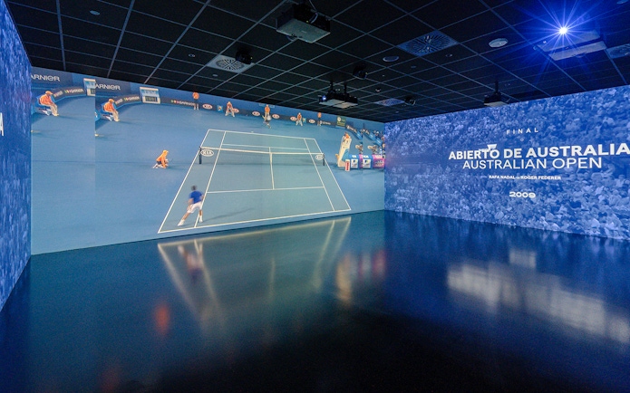 Rafa Nadal Museum interior featuring Australian Open tennis match display.