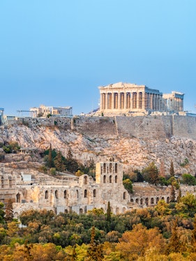 Acropolis in Athens with Parthenon and ancient ruins on a hilltop.