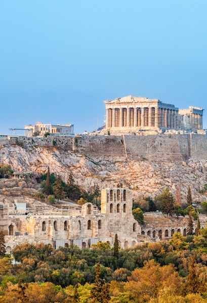 Acropolis in Athens with Parthenon and ancient ruins on a hilltop.