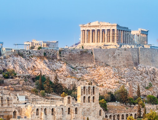 Acropolis in Athens with Parthenon and ancient ruins on a hilltop.