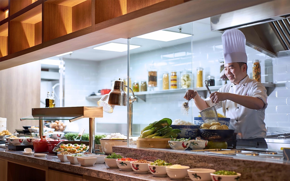 Chef preparing noodles at Plaza Premium Lounge, KLIA Terminal 1.