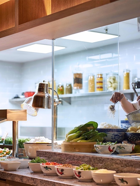 Chef preparing noodles at Plaza Premium Lounge, KLIA Terminal 1.