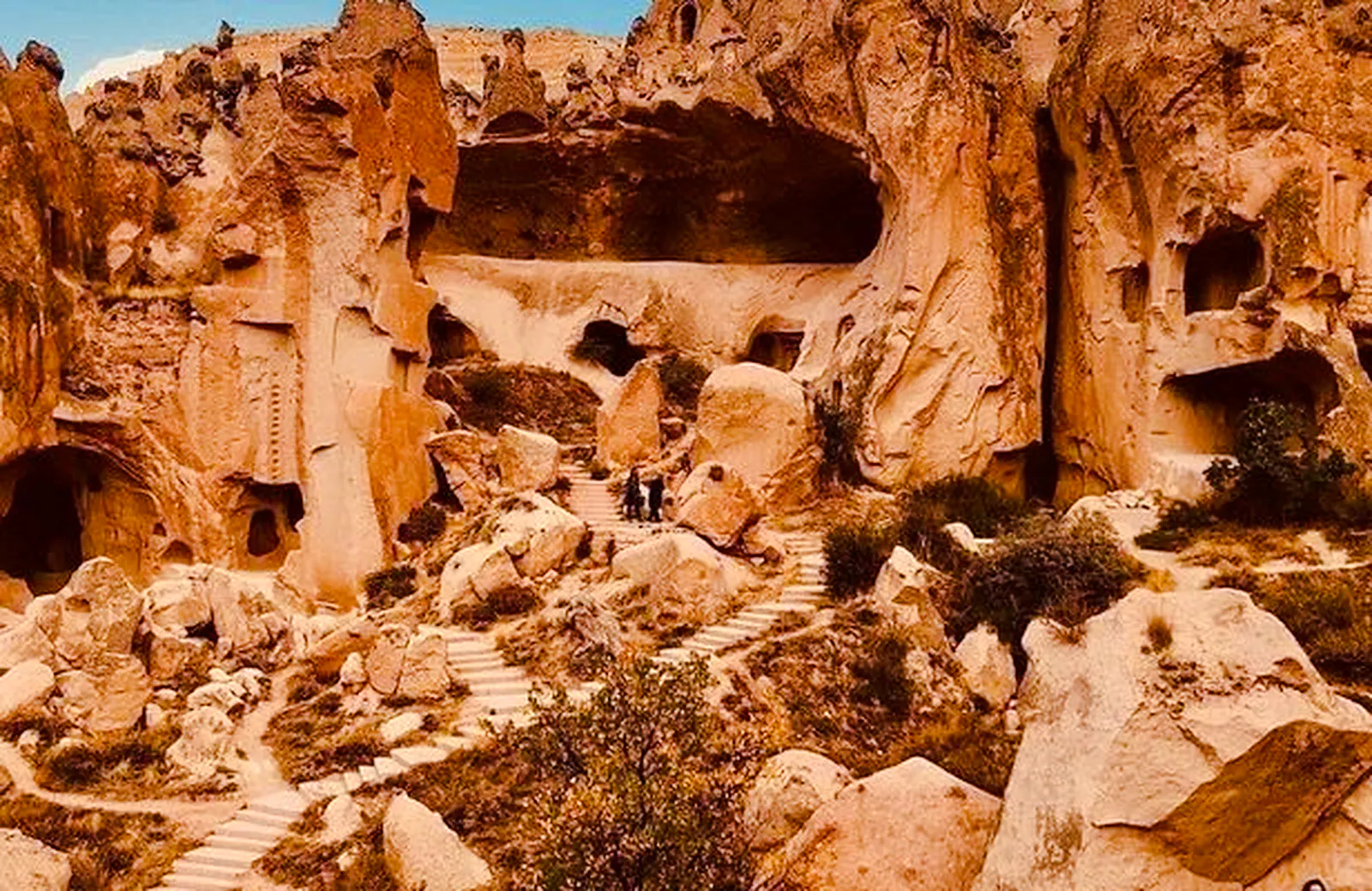 Ancient rock formations and pathways in Cappadocia, part of the Red Tour.