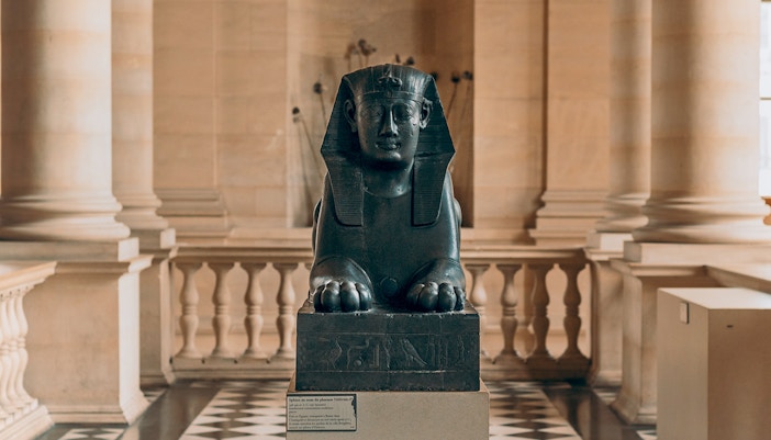 Egyptian statues displayed in the Louvre Museum, Paris.