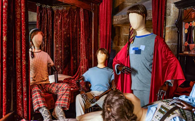 Mannequins in wizard attire at the Magical Mischief exhibit.