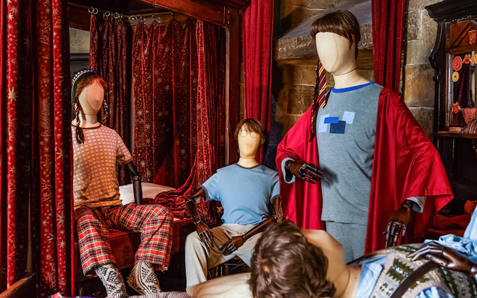 Mannequins in wizard attire at the Magical Mischief exhibit.
