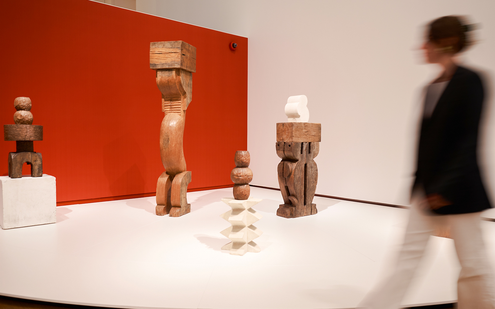Wooden sculptures on display at H’ART Museum exhibit.