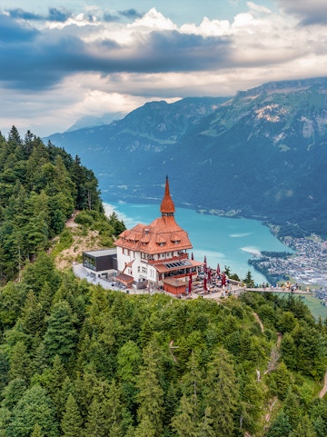 Harder Kulm viewpoint overlooking Lake Brienz and mountains in Interlaken, Switzerland.