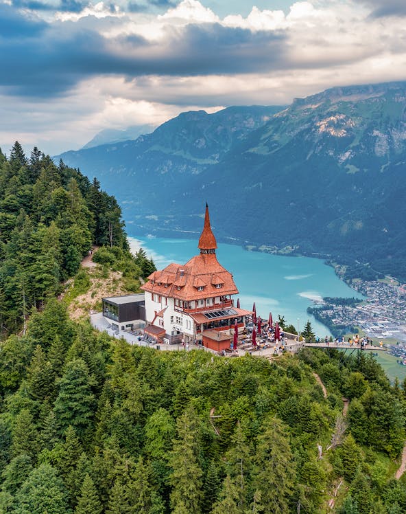 Harder Kulm viewpoint overlooking Lake Brienz and mountains in Interlaken, Switzerland.