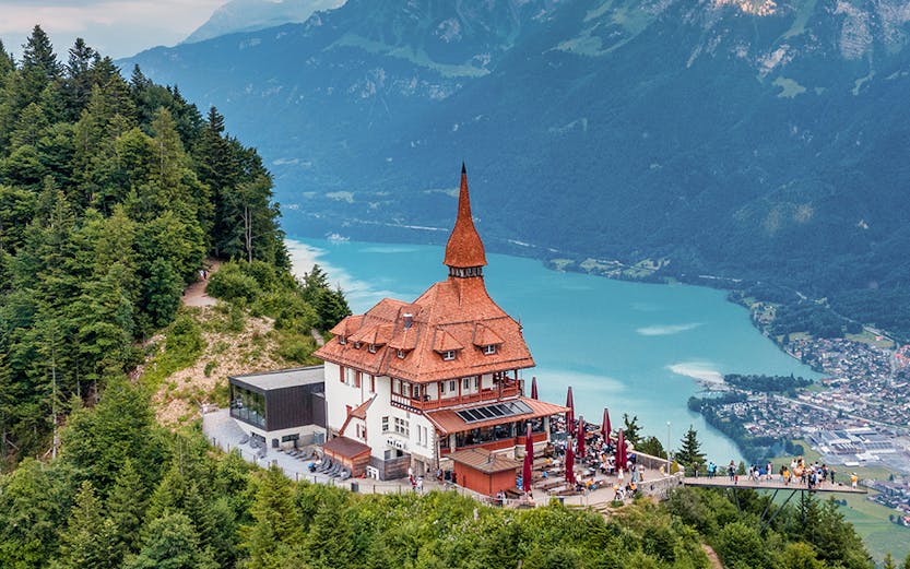 Harder Kulm viewpoint overlooking Lake Brienz and mountains in Interlaken, Switzerland.