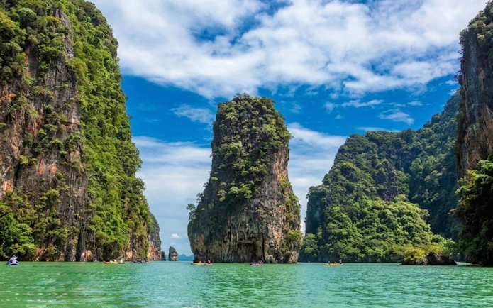 James Bond Island limestone cliffs and turquoise water, Phuket speedboat tour.