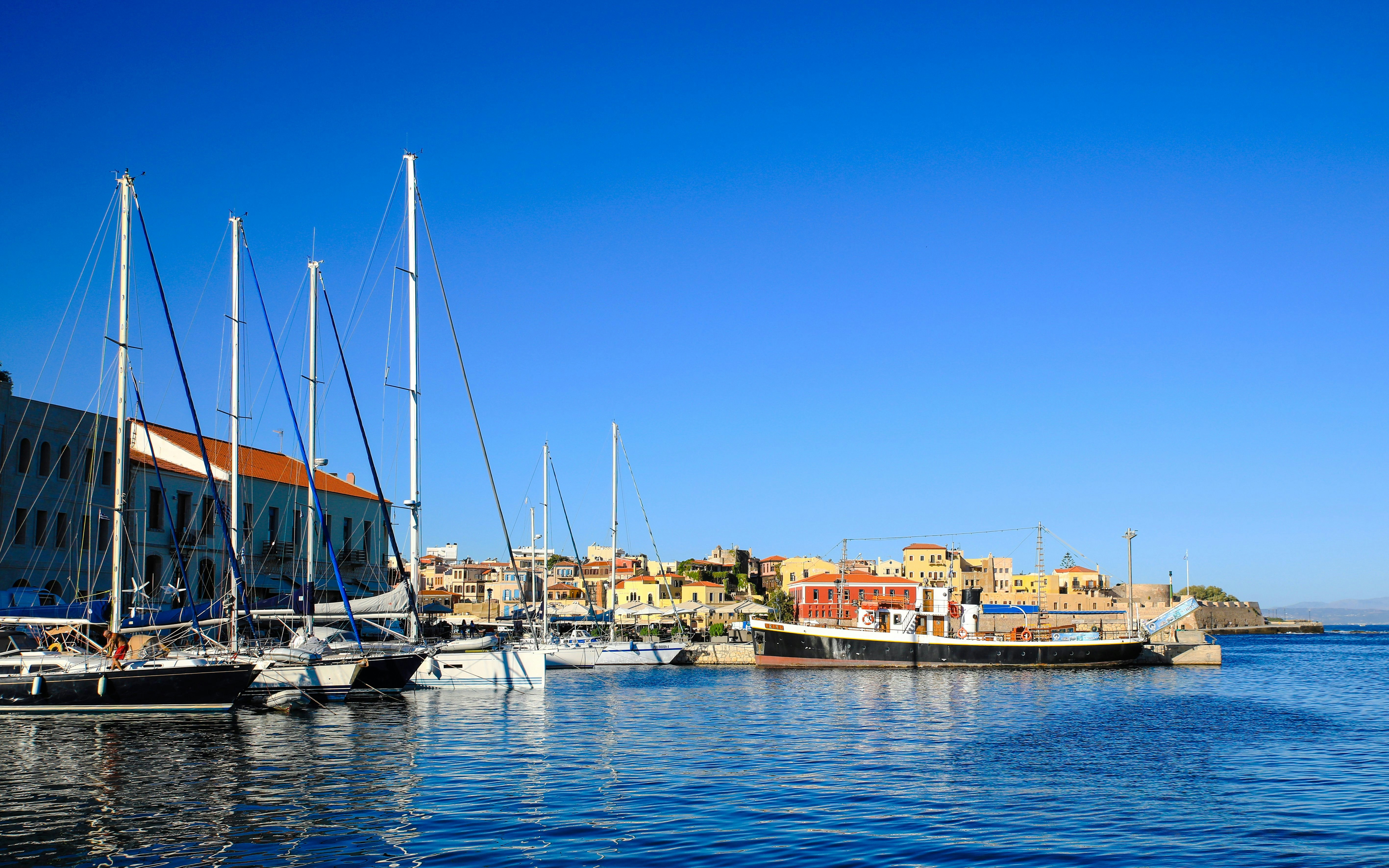 Sailboats docked at Souda Bay harbor, Crete island, Greece.