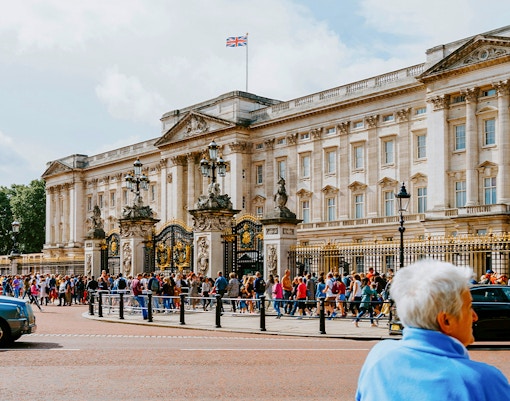 Crowd outside Buckingham Palace gates in London.