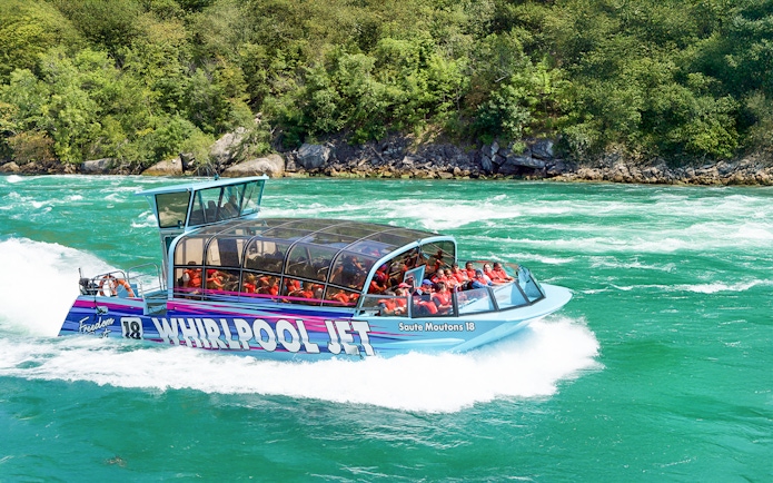 Guests enjoying the Freedom jet boat tour on the Niagara River Gorge, Niagara, Canada.