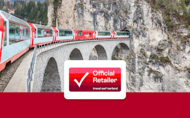 Train crossing the Landwasser Viaduct in Switzerland with Swiss rail pass.