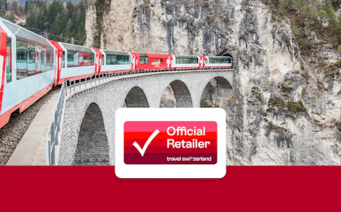 Train crossing the Landwasser Viaduct in Switzerland with Swiss rail pass.