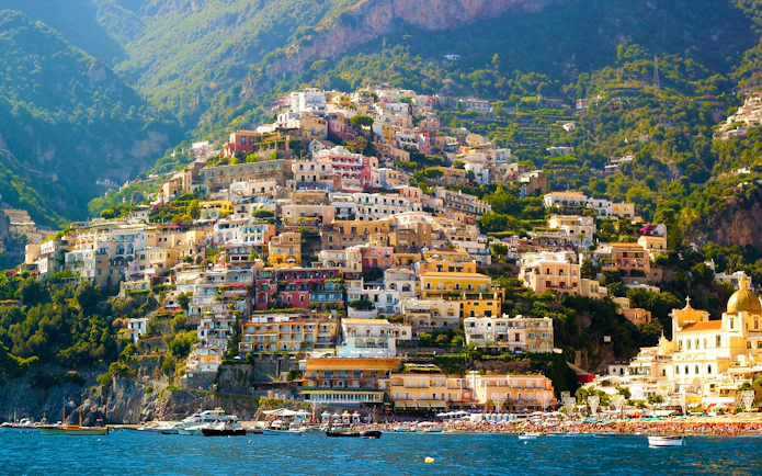 Positano hillside view with colorful buildings along the Amalfi Coast, Italy.