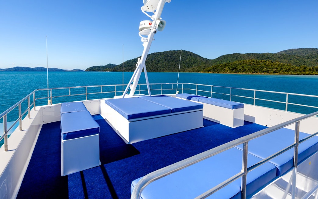 Cruise deck overlooking turquoise waters near Airlie Beach, Hill Inlet, and Whitehaven Beach.