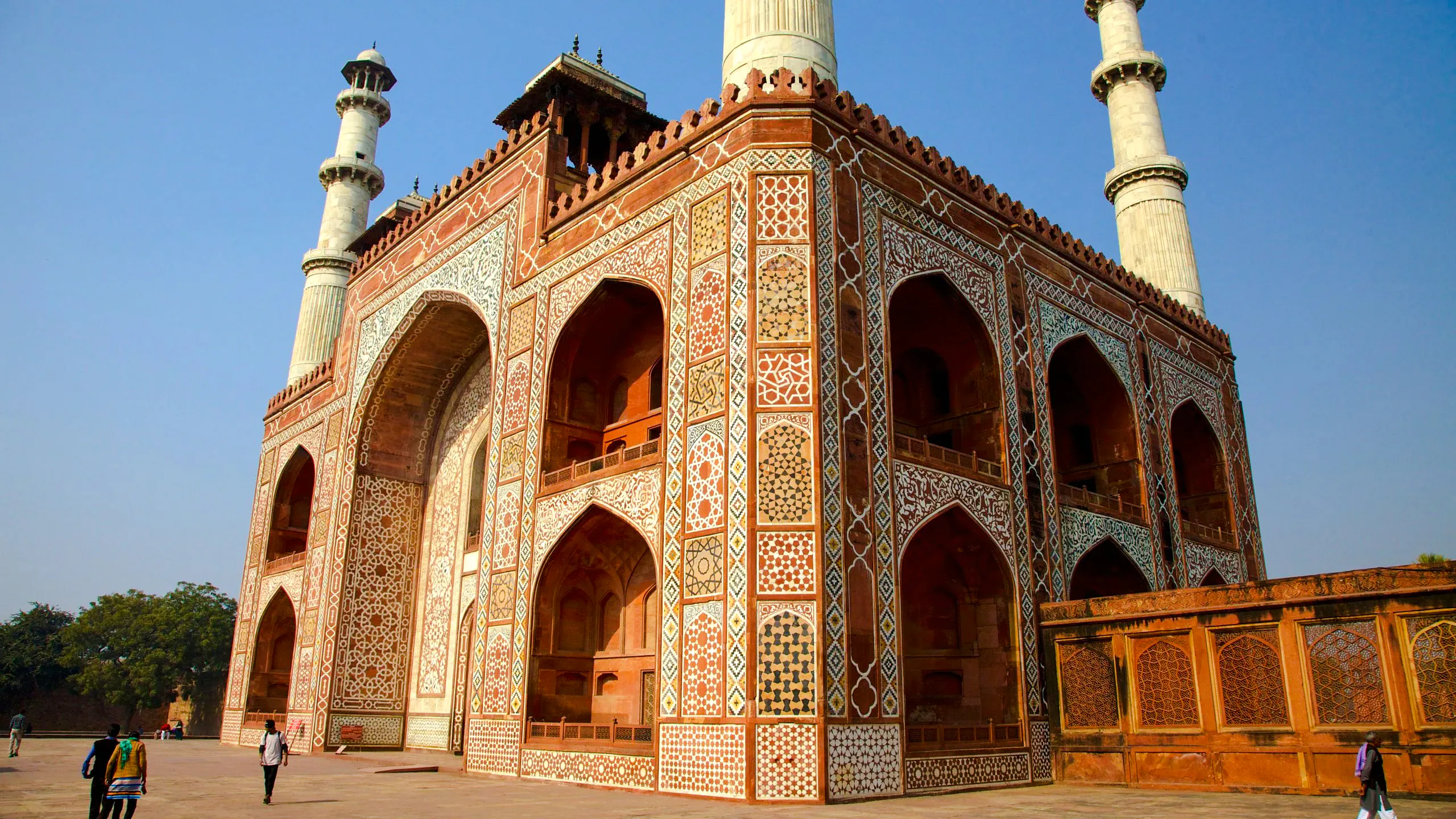 Akbar's Tomb with intricate Mughal architecture, Agra Heritage Tour.