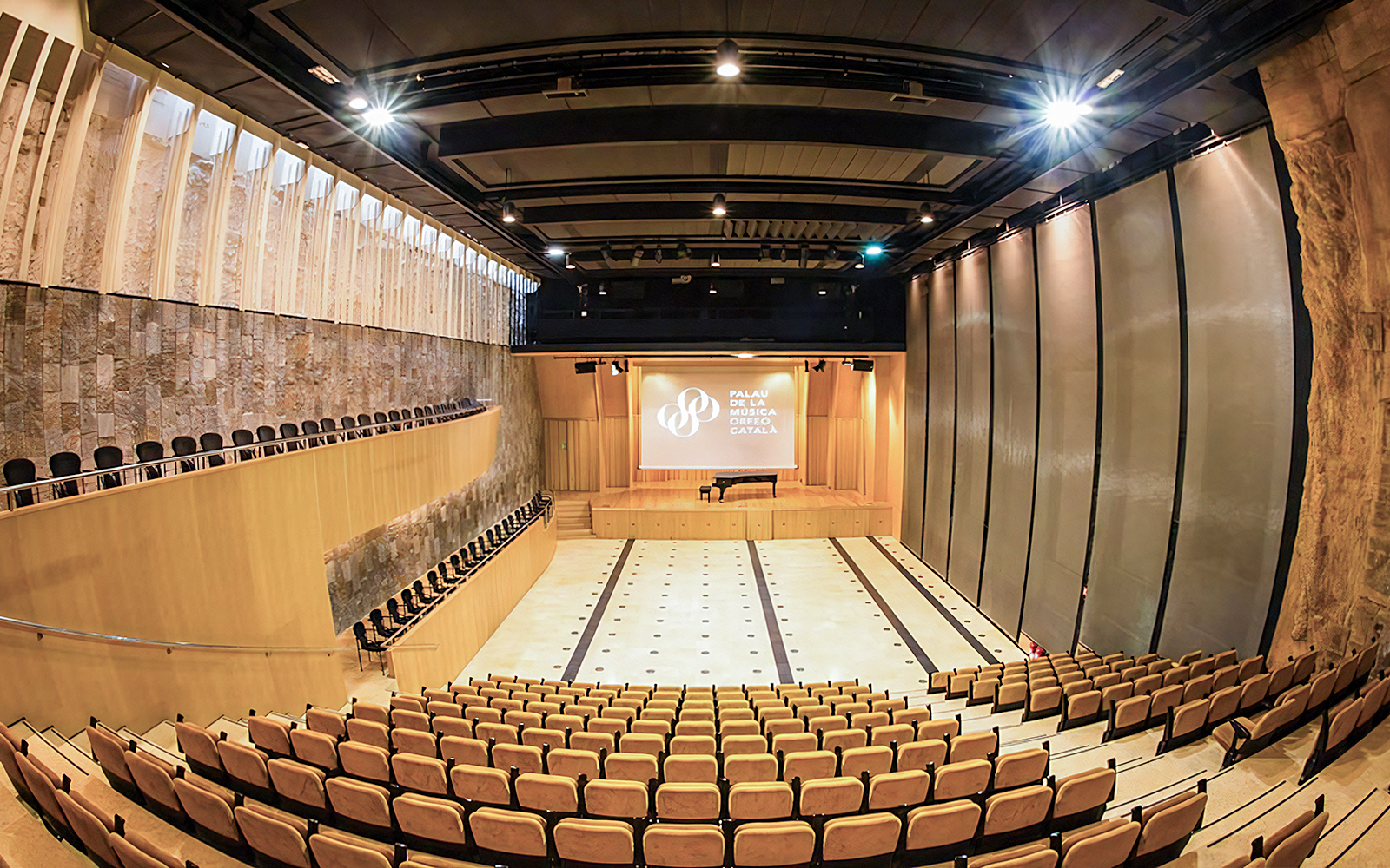Petit Palau auditorium at Palau de la Música Catalana, Barcelona, featuring seating and stage.