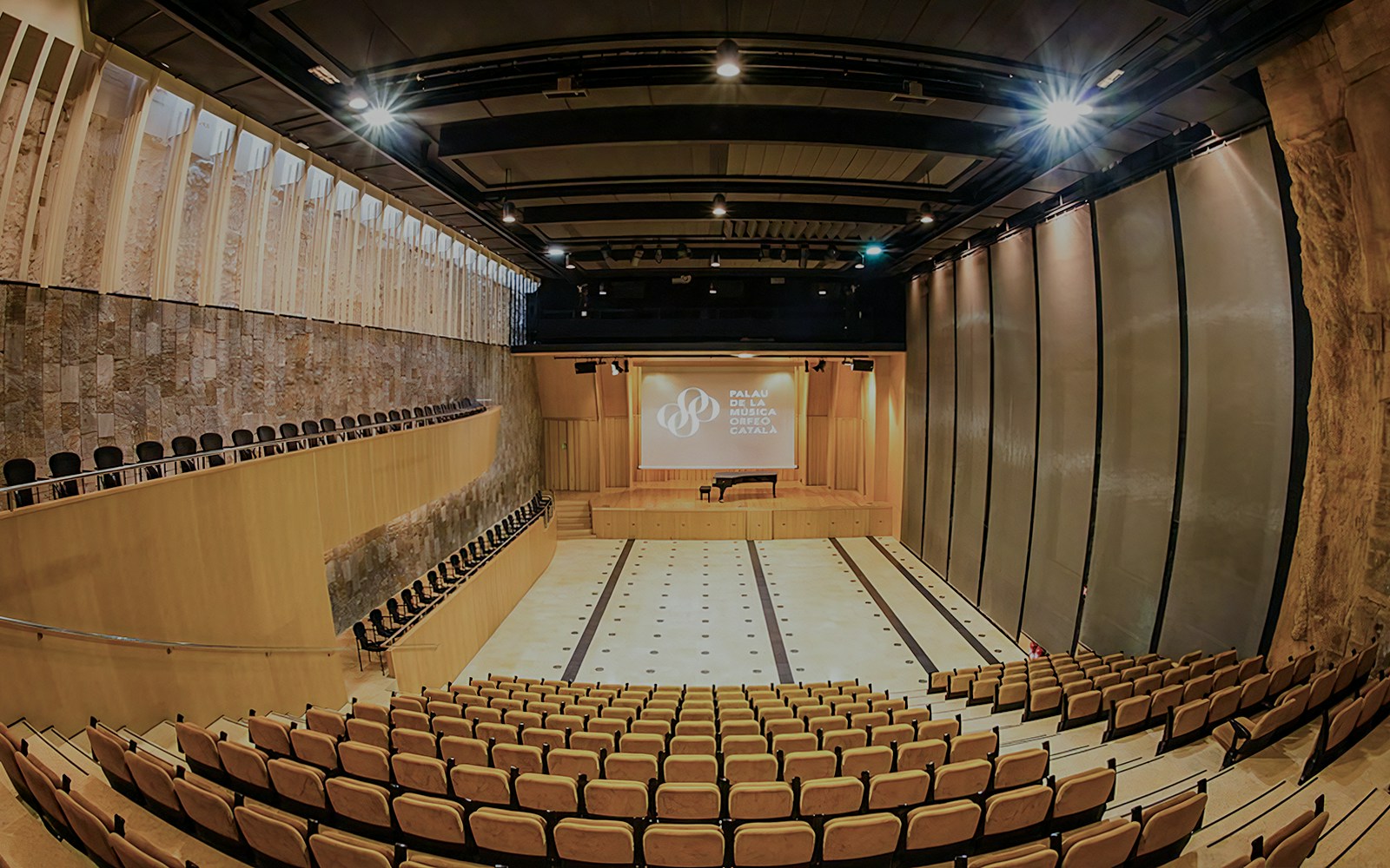 Petit Palau auditorium at Palau de la Música Catalana, Barcelona, featuring seating and stage.