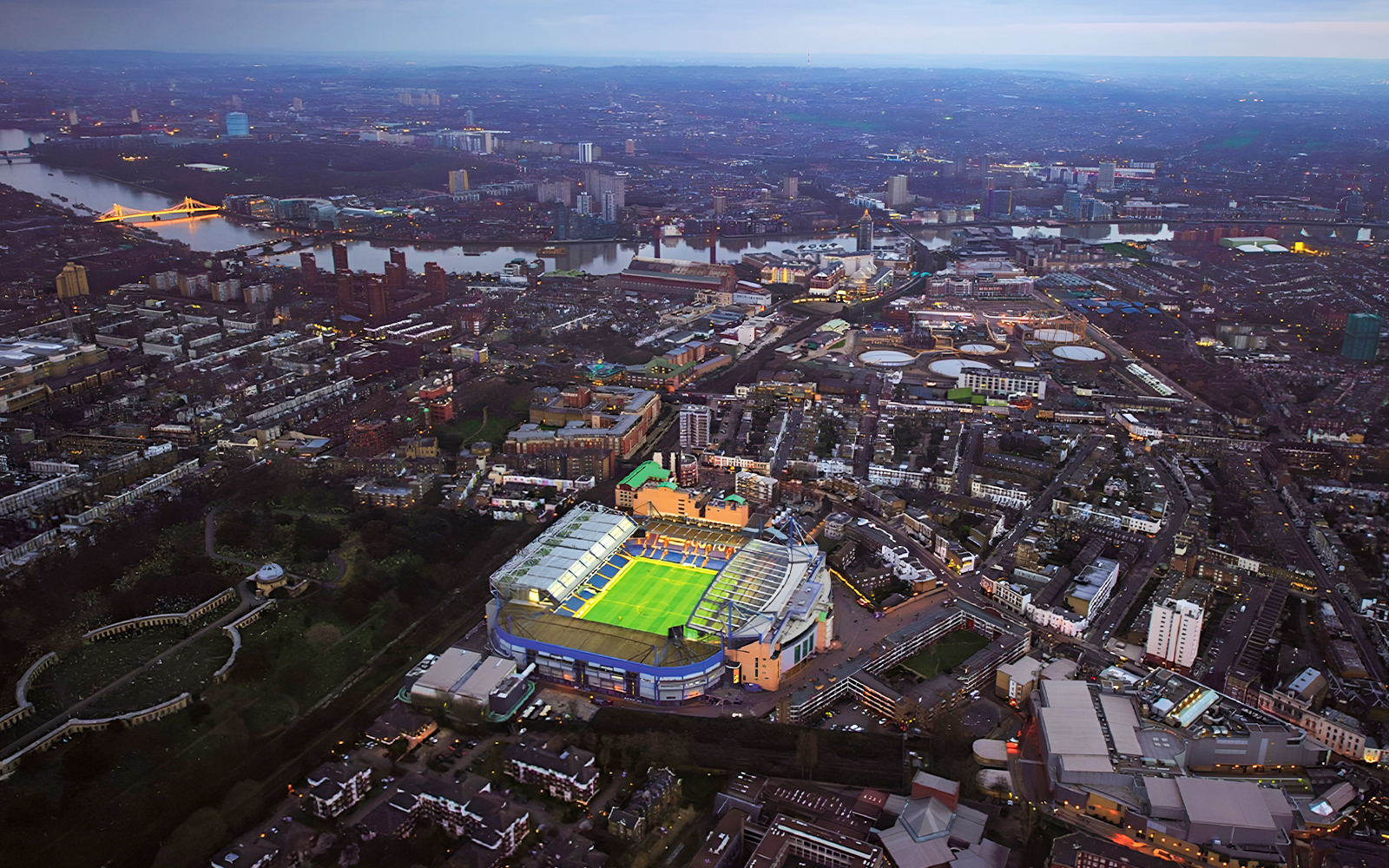 Aerial view of Stamford Bridge, home of Chelsea FC, in London at dusk.