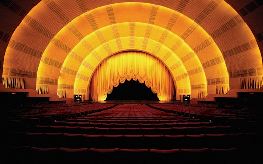 Radio City Music Hall interior with stage and seating, New York City.