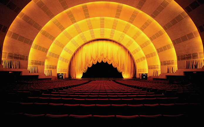 Radio City Music Hall interior with stage and seating, New York City.