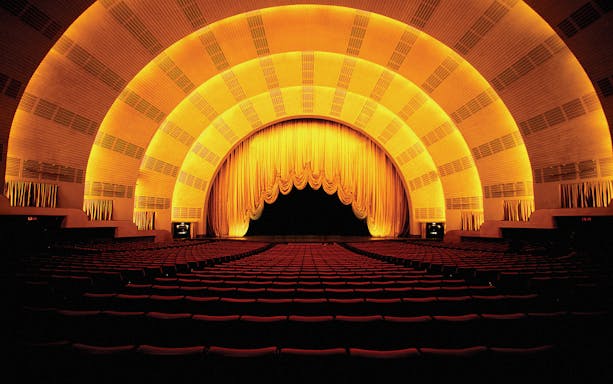 Radio City Music Hall interior with stage and seating, New York City.