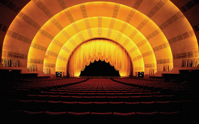 Radio City Music Hall interior with stage and seating, New York City.