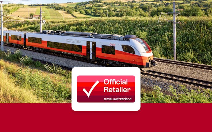 Eurail train traveling through scenic countryside