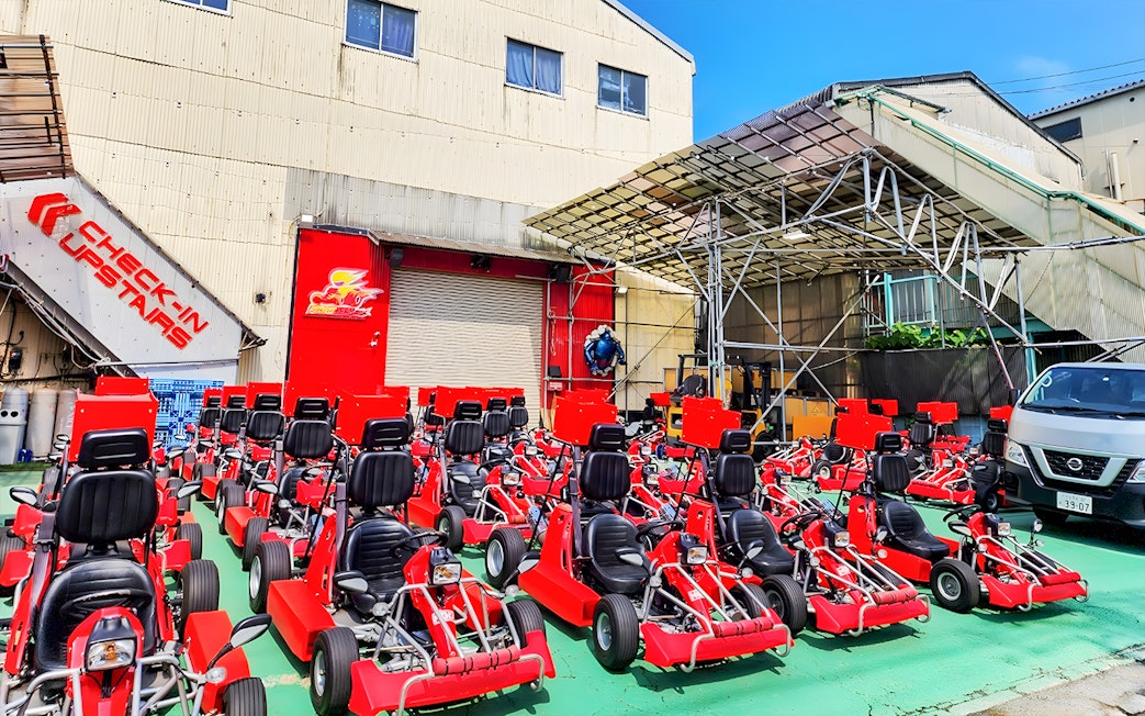 Go karts lined up for street go-karting experience at Tokyo Bay.
