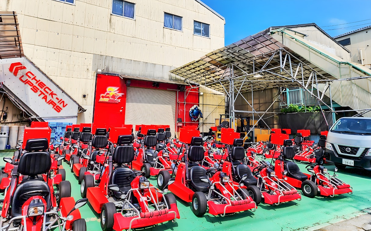 Go karts lined up for street go-karting experience at Tokyo Bay.