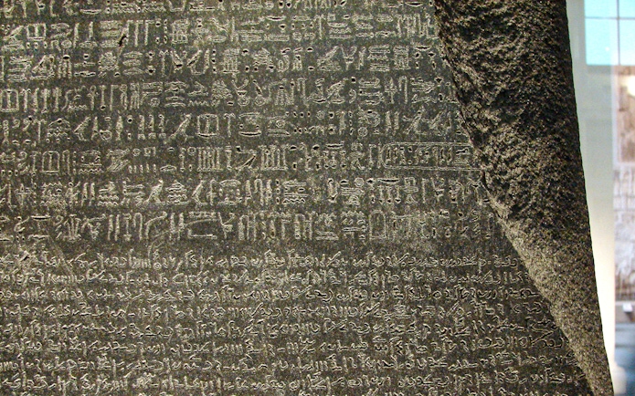 Rosetta Stone with ancient inscriptions at the British Museum.