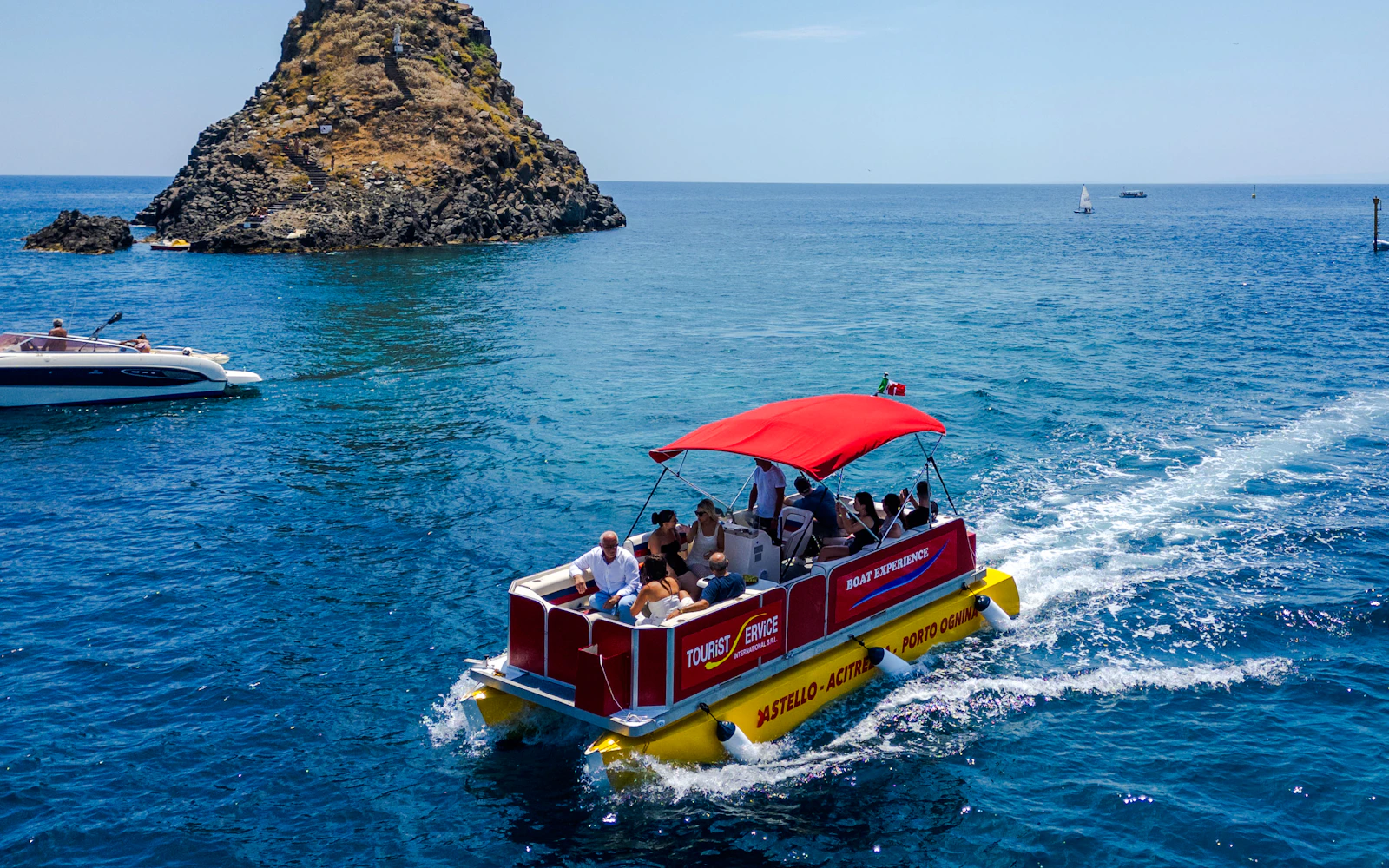 From Catania: Cyclops Coast Boat Tour with Welcome Aperitif and Swimming Stop