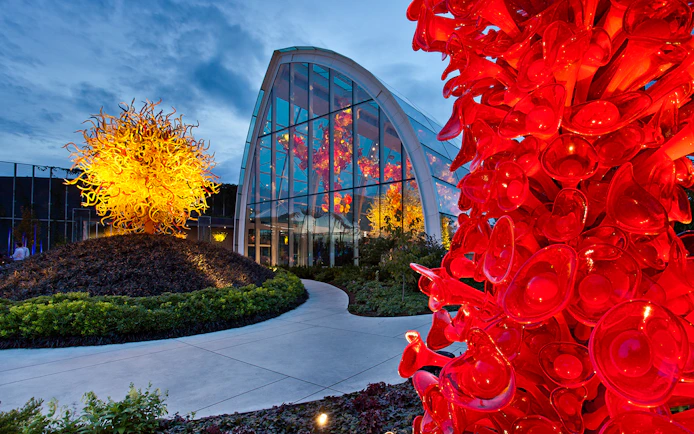 Chihuly Garden and Glass sculptures in Seattle, featuring vibrant red and yellow glass art.