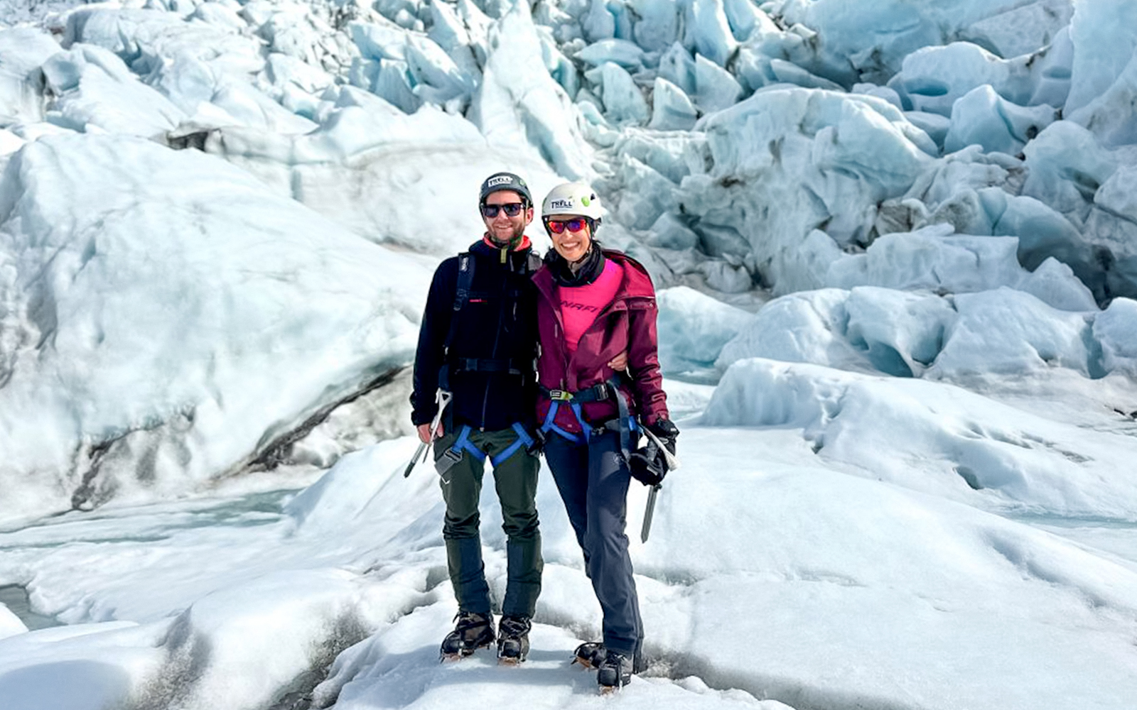 Guests on a glacier expedition at Vatnajökull, Iceland, wearing climbing gear.