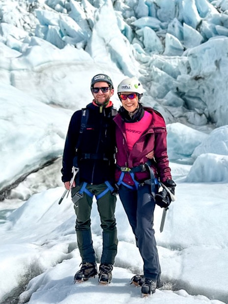 Guests on a glacier expedition at Vatnajökull, Iceland, wearing climbing gear.
