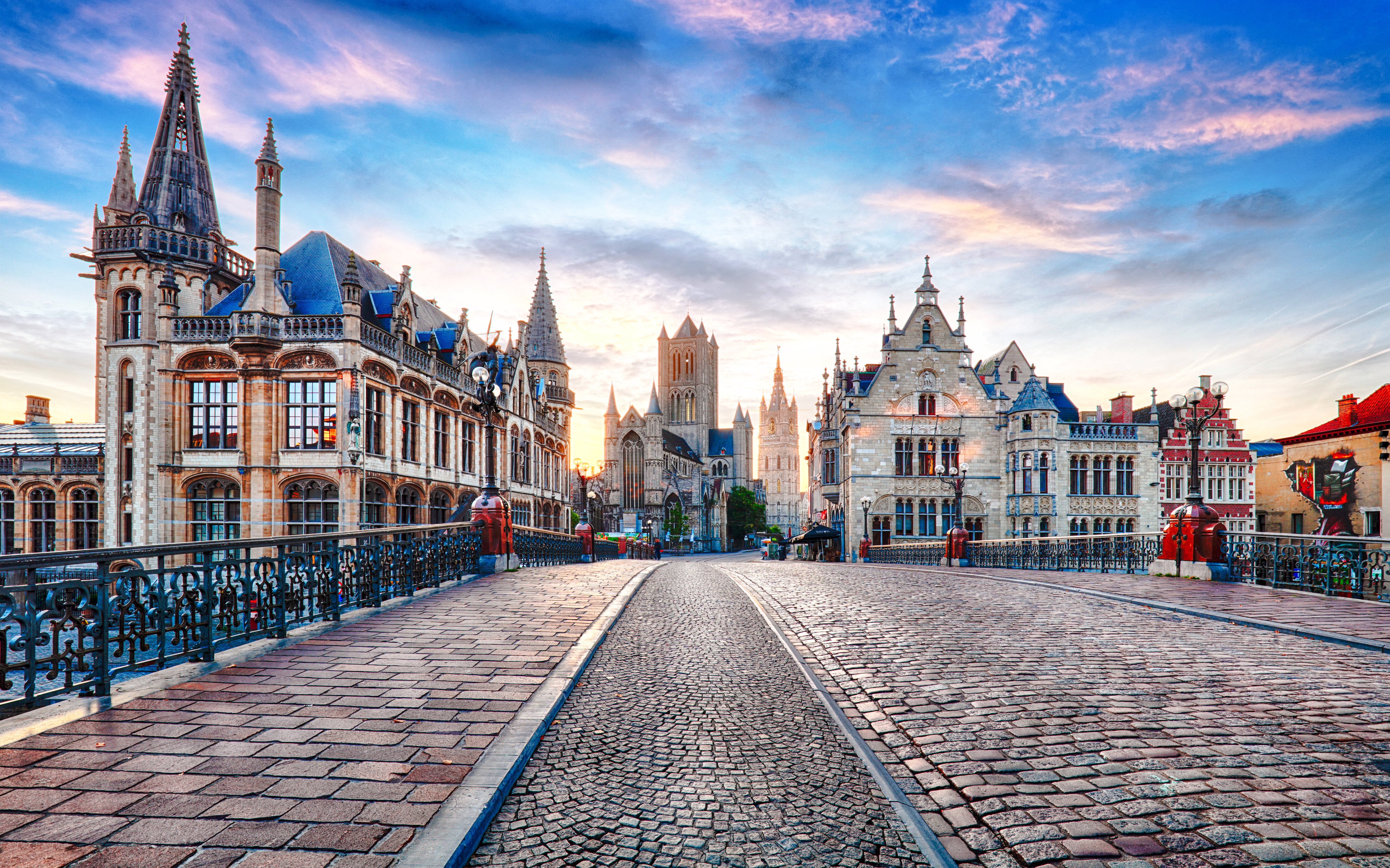View from Sint-Michielsbrug in Ghent, Belgium, towards historic center with medieval architecture.