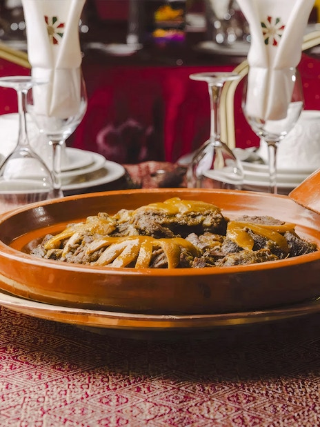 Moroccan tagine dish served at Chez Ali Dinner & Fantasia Show.